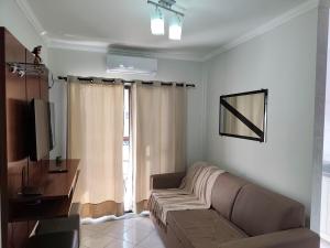 Фотография из галереи Apartamento completo perto da praia do Sesc Bertioga в городе Бертиога