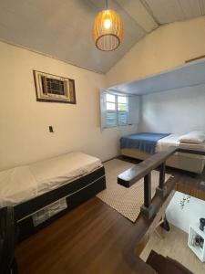 Postel nebo postele na pokoji v ubytování Beira Mar Suite Búzios A 400 m del mar