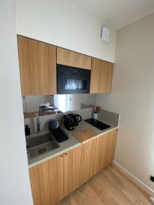 a kitchen with a sink and a counter top at Le Cocon d'Oberthur - Proche Thabor in Rennes
