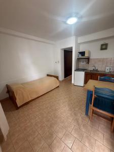 Кухня или мини-кухня в Apart Hotel Posta Marina
