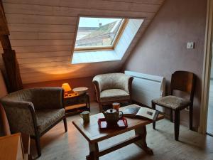 Χώρος καθιστικού στο Suite familiale "La Siaulnée"