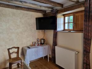 Παροχές για τσάι/καφέ στο Chambre "Rose des Sables", Domaine de la Rue