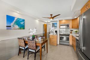 Kuchyň nebo kuchyňský kout v ubytování Mana Kai 810