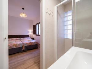 Giường trong phòng chung tại Casa de La Canita +28 ảnh