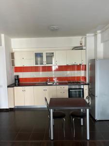 Kuchyň nebo kuchyňský kout v ubytování Bella Home Apartment + 5 fotografií