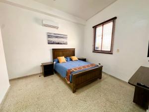 Кровать или кровати в номере Colonial Home with Private Terrace and Jacuzzi