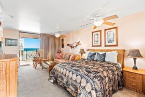 En eller flere senge i et værelse på Noelani 212