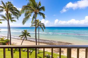 a view of the beach from a balcony at Paki Maui 405 in Honokowai
