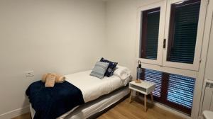 Postel nebo postele na pokoji v ubytování LAIDA BEACH by Urdaibai Experience