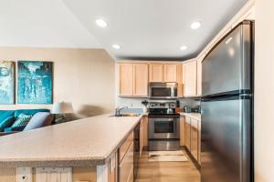 Kuchyň nebo kuchyňský kout v ubytování Napili Point B41