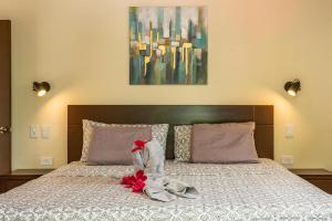 Ένα ή περισσότερα κρεβάτια σε δωμάτιο στο Jardín de los Monos