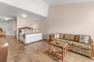 Ένα ή περισσότερα κρεβάτια σε δωμάτιο στο Kihei Bay Surf 245