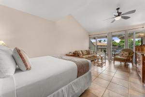 Ένα ή περισσότερα κρεβάτια σε δωμάτιο στο Kihei Bay Surf 245 +9 φωτογραφίες