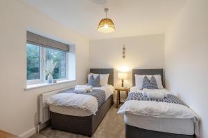 Postel nebo postele na pokoji v ubytování 4 Bed in Llanigon oc-t33091