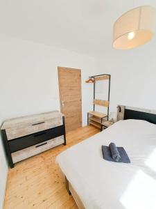 Postel nebo postele na pokoji v ubytování Les Sardines + 19 fotografií