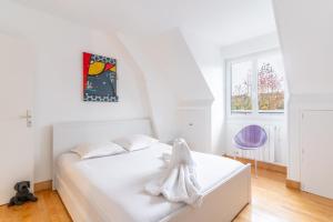 En eller flere senge i et værelse på La Villa du Bonheur - Honfleur + 57 billeder