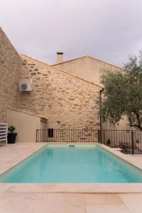 La alberca dentro o cerca de Le Mas de l'eau - Piscine Privative