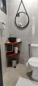 Et badeværelse på Portal suítes Avenida Paraty