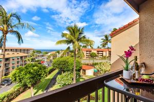 a balcony with a view of the ocean at Maui Vista 3403 in Kihei