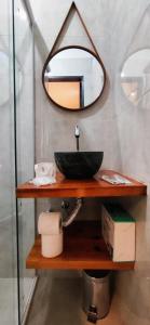 Et badeværelse på Portal suítes Avenida Paraty