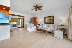 a living room with a couch and a table at Kapalua Ridge Villa 2712 in Kapalua
