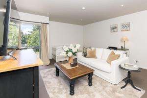 Una televisión o centro de entretenimiento en Central Methven Apartment