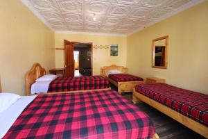 Postel nebo postele na pokoji v ubytování La Casa Cuencana