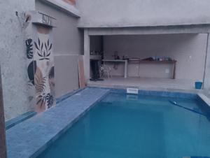 Swimmingpoolen hos eller tæt på Casa na Prainha de Mambucaba