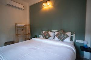 Postel nebo postele na pokoji v ubytování Wonderland Mandrem