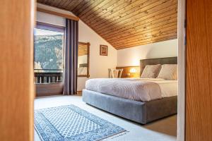 Кровать или кровати в номере Gästehaus Kaiserblick