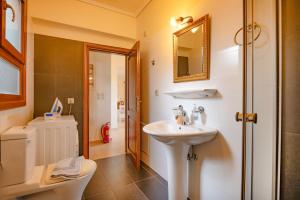 Koupelna v ubytování Villa Asteri + 43 fotografií