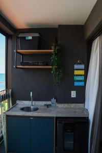 Køkken eller tekøkken på Kauai Beach Residence