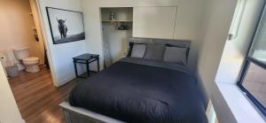 Postel nebo postele na pokoji v ubytování Amazing 2Bdr