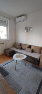 Posezení v ubytování Decembar