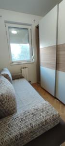 Postel nebo postele na pokoji v ubytování Decembar