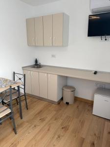 Køkken eller tekøkken på Carolina Residence