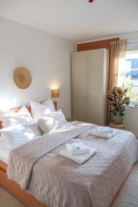 Postel nebo postele na pokoji v ubytování Zenkoje - Ihr Ferienzuhause in der Pfalz!