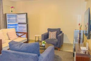 TV a/nebo společenská místnost v ubytování Ebony 1br Nanyuki town