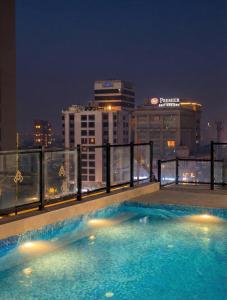 Πισίνα στο ή κοντά στο Midcity 1 BR, Condo, Gulberg Lahore Self Check IN