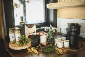 Η κουζίνα ή μικρή κουζίνα στο Chalet Eden Roc luxueux avec Jacuzzi et Sauna Privés 6 personnes