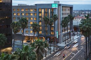 an aerial view of a building with palm trees at AC Hotel by Marriott San Jose Downtown in San Jose