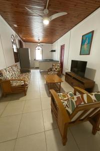 Un televizor și/sau centru de divertisment la Anse paradis