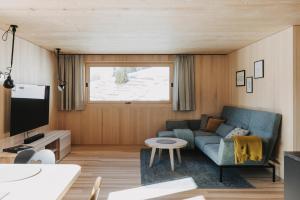 TV a/nebo společenská místnost v ubytování Ferienhaus Halwina hideaway