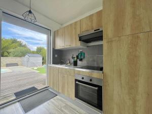 Η κουζίνα ή μικρή κουζίνα στο Le Cocon d'Angles