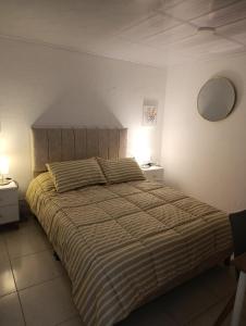 Postel nebo postele na pokoji v ubytování Colitalia Apartments