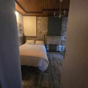 Postel nebo postele na pokoji v ubytování Κτήμα Βασίληγιάννη + 46 fotografií