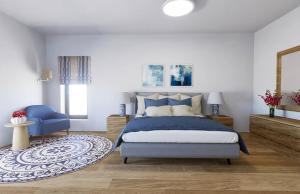 En eller flere senge i et værelse på Mirabello Bay House