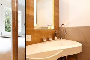 Un baño de Steinenschanze Charming City & Garden Hotel