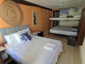 Postel nebo postele na pokoji v ubytování Marina Beach Guest House