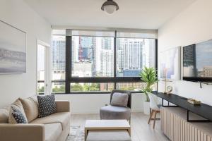 TV a/nebo společenská místnost v ubytování Nomada Residences - District 225